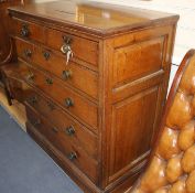 A 19th century panelled oak chest of drawers, W.103cm D.56cm H.112cm Condition: The top has two
