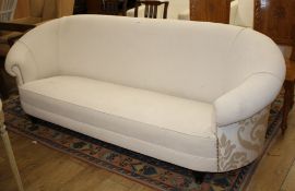 An Italian settee, upholstered in white velvet type material with gold foliate scroll fabric to