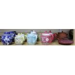 Three Chinese blue and white prunus pattern ginger jars, two other jars and ten assorted teapots