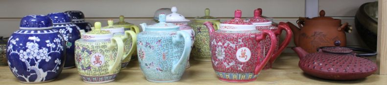 Three Chinese blue and white prunus pattern ginger jars, two other jars and ten assorted teapots