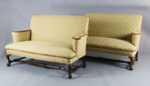 A Queen Anne upholstered scroll arm sofa and a matching reproduction sofa, with cabriole legs,