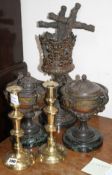 A pair of late Victorian cast iron two handled urns, one with odd lid, an oil lamp base, a pair of
