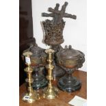 A pair of late Victorian cast iron two handled urns, one with odd lid, an oil lamp base, a pair of