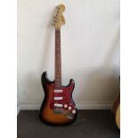 A Squier Affinity Series electric guitar Condition: Electrics are working but very large amount of