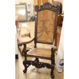 An 18th century style caned elbow chair, W.72cm D.60cm H.134cm Condition: The arms are faded through