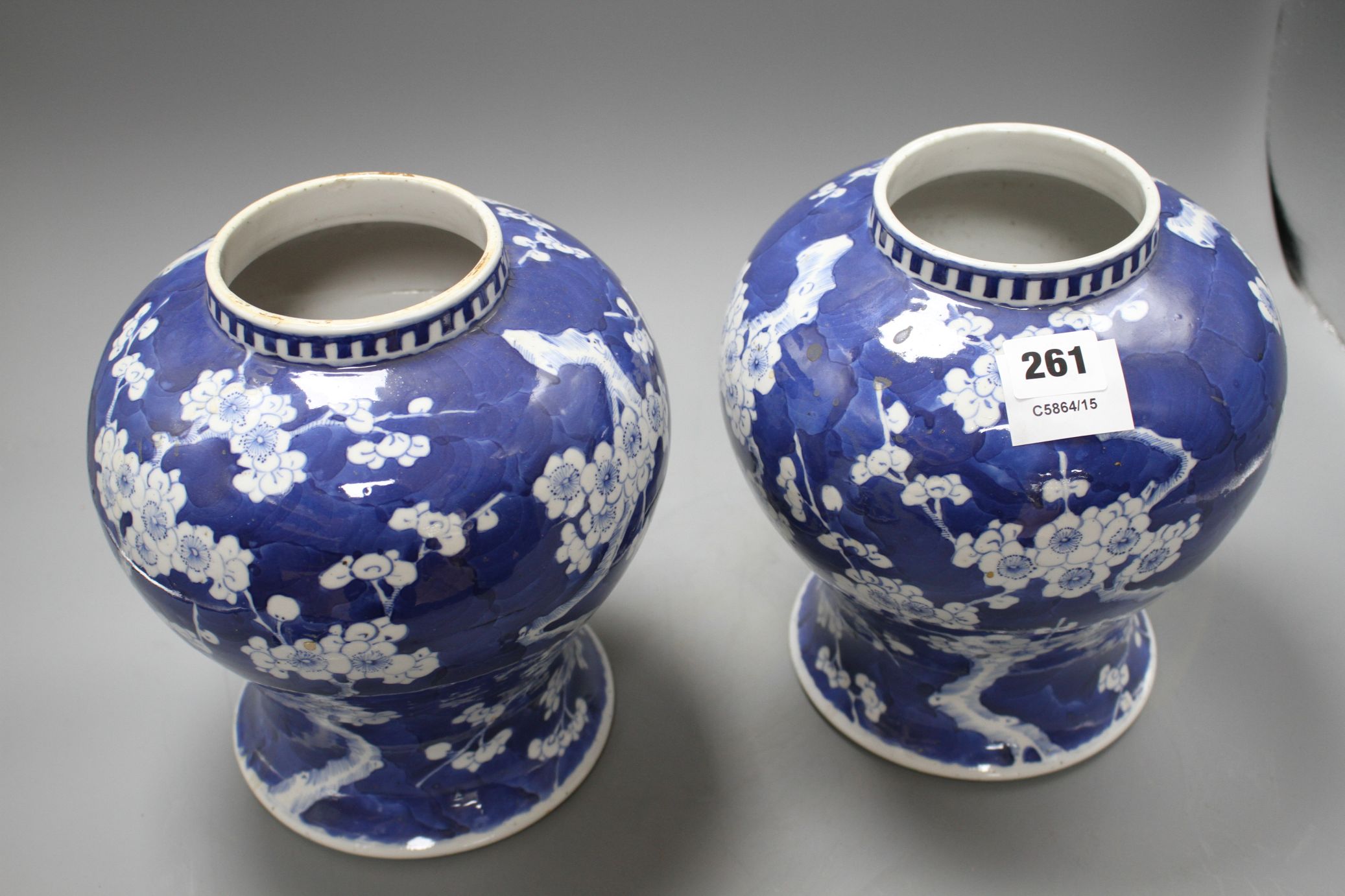 A pair of late 19th century Chinese prunus pattern baluster vases and covers, height 29cm Condition: - Image 4 of 6