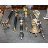 Two pairs of brass mounted beer pumps and two single pumps, largest 46cm Condition: Some wear from