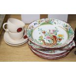 A pair of Moorcroft tea cups and saucers, with floral mons decoration and a Copeland Spode eight