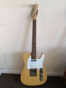 An Extreme Telecaster style electric guitar Condition: Electrics all working, chips and scuffs to