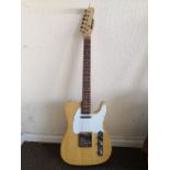 An Extreme Telecaster style electric guitar Condition: Electrics all working, chips and scuffs to