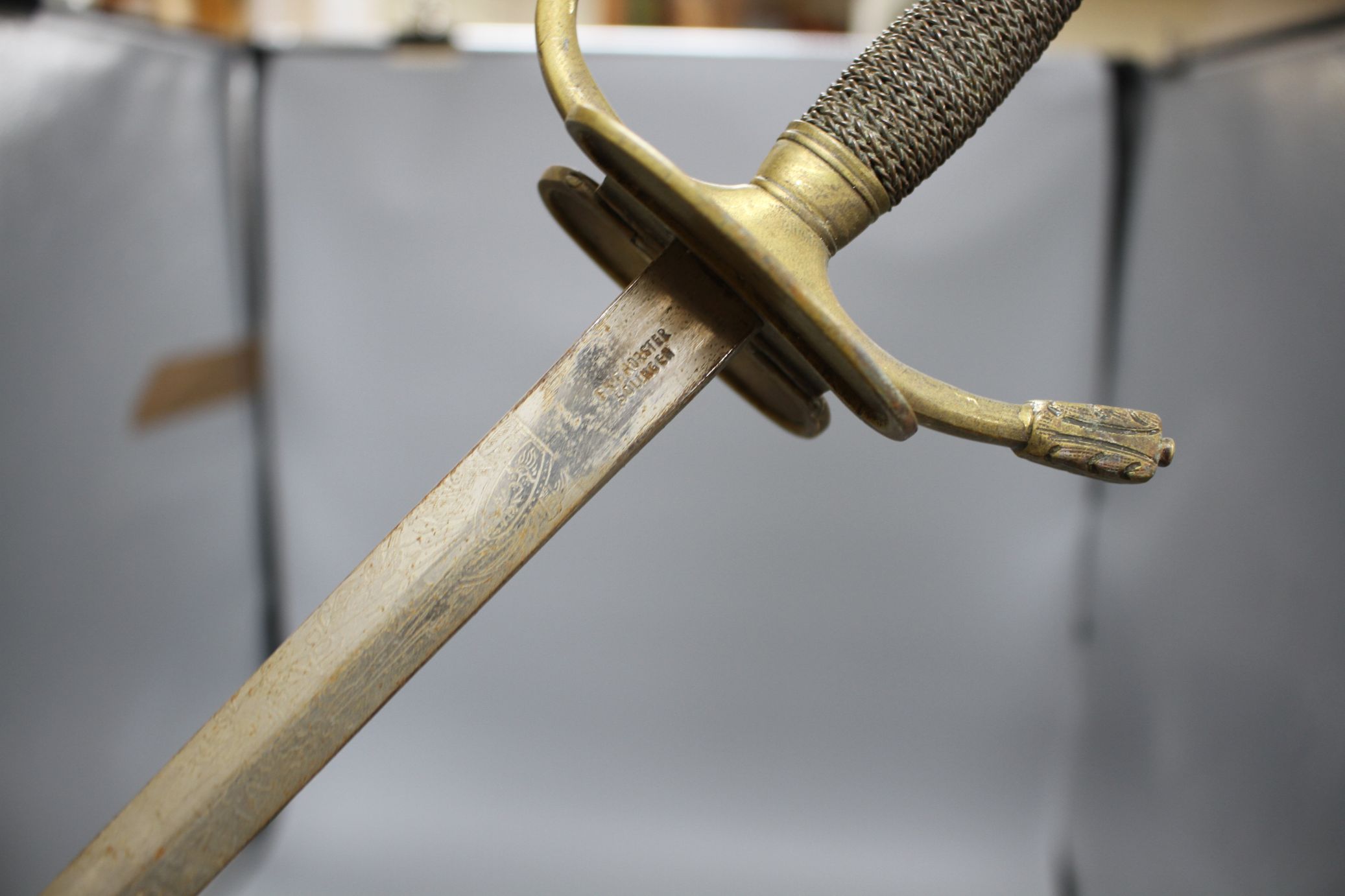 A cut steel dress sword by Ede & Ravenscroft of London and two brass hilted dress swords Condition:- - Image 15 of 30