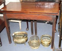 A George III mahogany folding top tea table, with chamfered legs, W.95cm D.45cm H.74cm Condition: Of