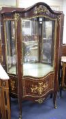 A Meuble Francais marquetry inlaid serpentine vitrine, W.94cm D.40cm H.180cm Condition: Very good