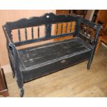 A Continental painted pine box seat settle, W.123cm D.46cm H.92cm Condition: The settle has been