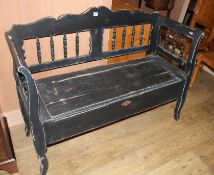 A Continental painted pine box seat settle, W.123cm D.46cm H.92cm Condition: The settle has been