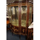 A Meuble Francais marquetry inlaid bowfront vitrine, W.124cm D.52cm H.177cm Condition: Very good