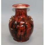 A Chinese flambe vase, with lion mask ring handles to the shoulder, height 28.5cm Condition: Crazing