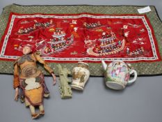 A small Cantonese porcelain teapot, a Satsuma vase, a silkwork panel, a doll and a broken