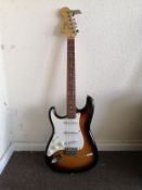 A left handed Squier Strat Affinity Series electric guitar Condition: Electrics all working, crackle