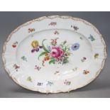 A Dresden porcelain meat plate, painted with flowers, 38.5cm Condition: Good condition just needs