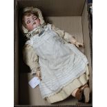 A Simon & Halbig Kammer & Reinhardt doll, original clothes, body in good condition, pale oily