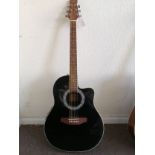 A Martin Smith roundback electro-acoustic guitar Condition: Electrics all working, no visible