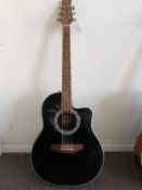 A Martin Smith roundback electro-acoustic guitar Condition: Electrics all working, no visible