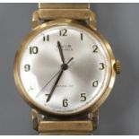 A gentleman's 1960's 9ct gold Avia manual wind wrist watch, on a gold plated strap, with Avia box.