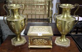 An ornate Italian gilt metal casket, 29cm and a pair of gilt metal vases on onyx plinths, height