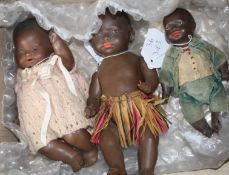 An AM 351 black baby, jointed body, 8in., a Heubach black doll, 9in., paint loss on neck and a