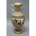 A large Villeroy and Boch Mettlach ewer, decorated with figures drinking, dancing and musicians,