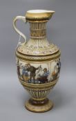 A large Villeroy and Boch Mettlach ewer, decorated with figures drinking, dancing and musicians,