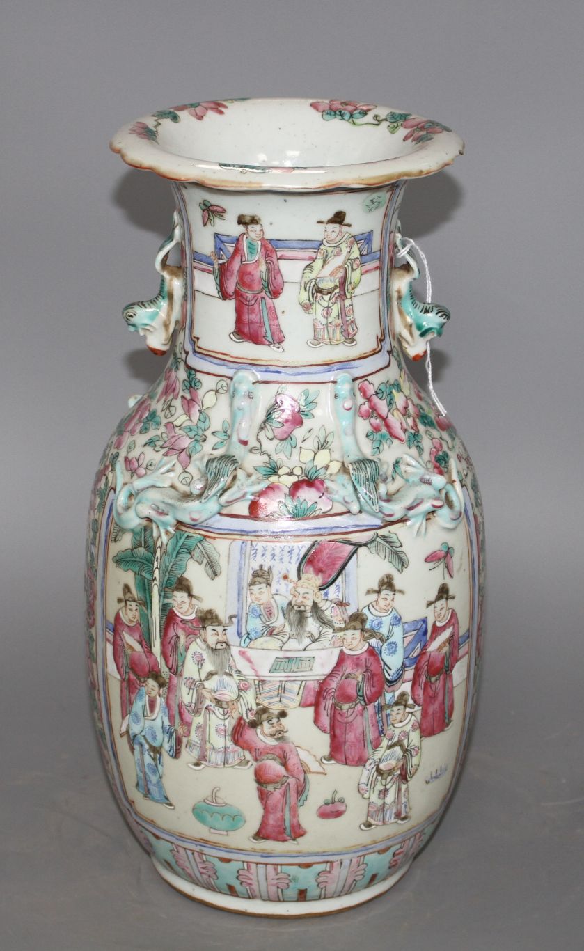 A 19th Chinese famille rose vase, decorated with panels of noblemen and attendants, height 35cm