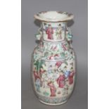 A 19th Chinese famille rose vase, decorated with panels of noblemen and attendants, height 35cm