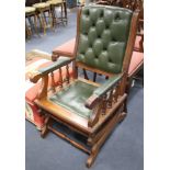 A Victorian style rocking chair with buttoned green leather upholstery, W.59cm D.74cm H.105cm