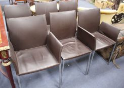 A set of six contemporary brown leather dining chairs, on squared steel underframes, including a