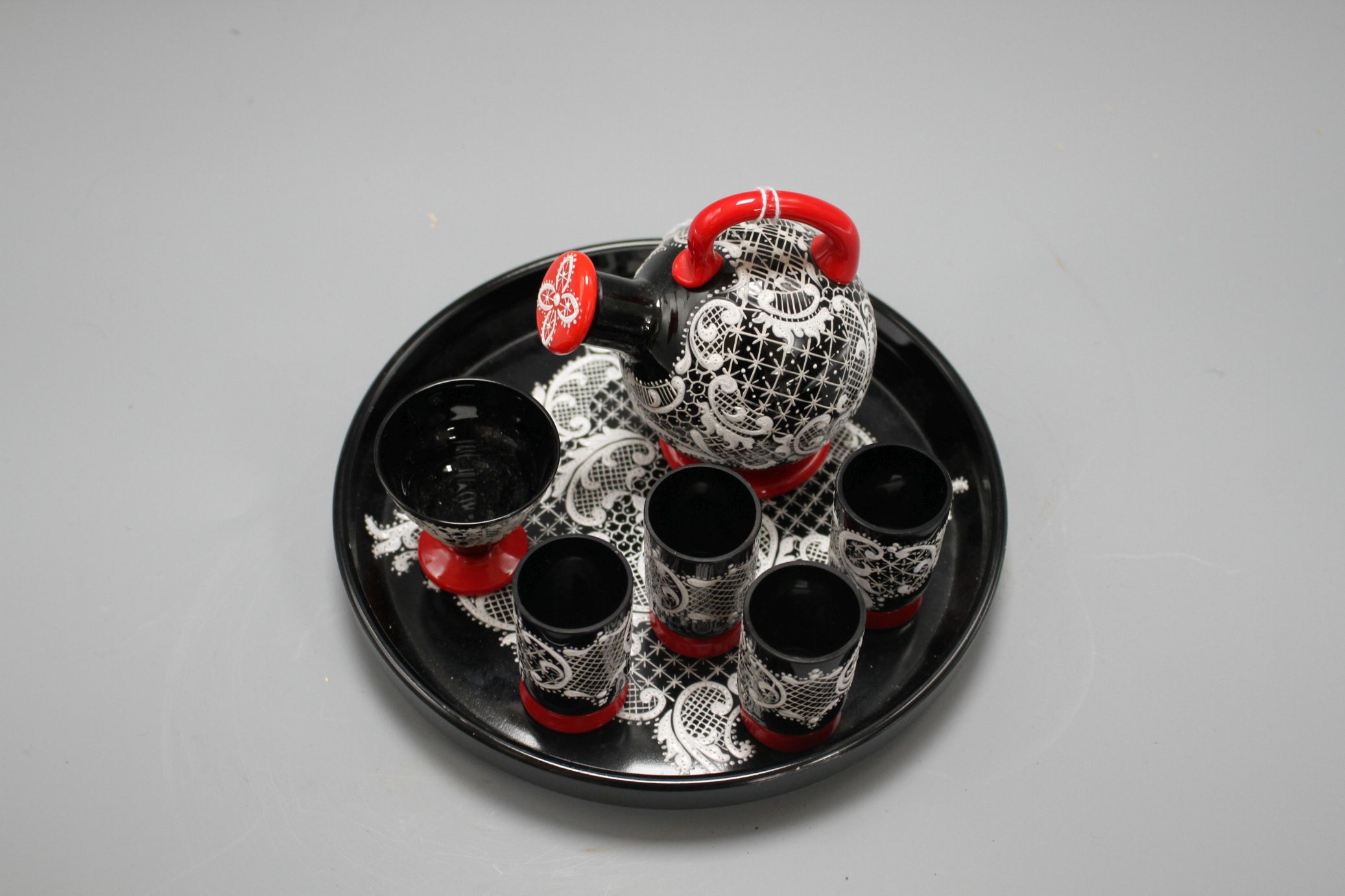 A Murano seven piece glass liqueur set, with lacework decoration, tray diameter 18cm Condition: - Image 2 of 6