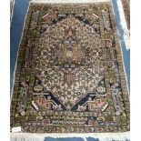 A North West Persian geometric rug, 150 x 105cm Condition: Unfaded 10cm piece missing from edge of 1