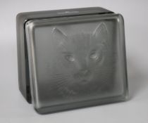 A modern Lalique smoky green tinted glass box, decorated with a cat's head, 11 x 9.5cm, height