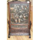 A late 19th / early 20th century Chinese hardstone table screen, applied with carved hardstone,