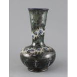George Tinworth for Doulton Lambeth, a Persian shape bottle vase, dated 1880, decorated with