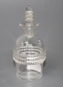 An R. Lalique glass scent bottle and stopper, with beaded decoration, etched mark in upper case,