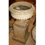 An early 20th century terracotta garden urn on square pedestal, H.96cm Diam.48cm Condition: