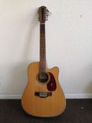 A Gear 4 Music Electro / Acoustic 12 string guitar Condition: Chips and markings to the body, neck