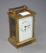 An Edwardian brass carriage timepiece with enamelled Roman dial, height 12.5cm Condition: Good clean