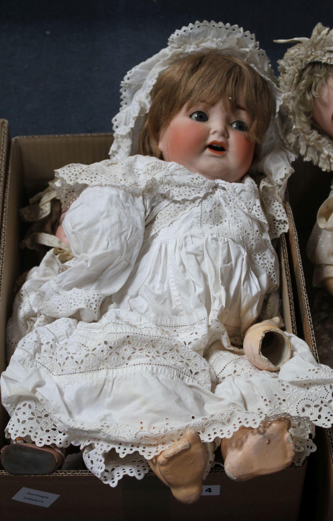 An AM 1894 doll, 18in. and a Heubach doll, bent limb, lower detached, 22in. (a.f.) (2)