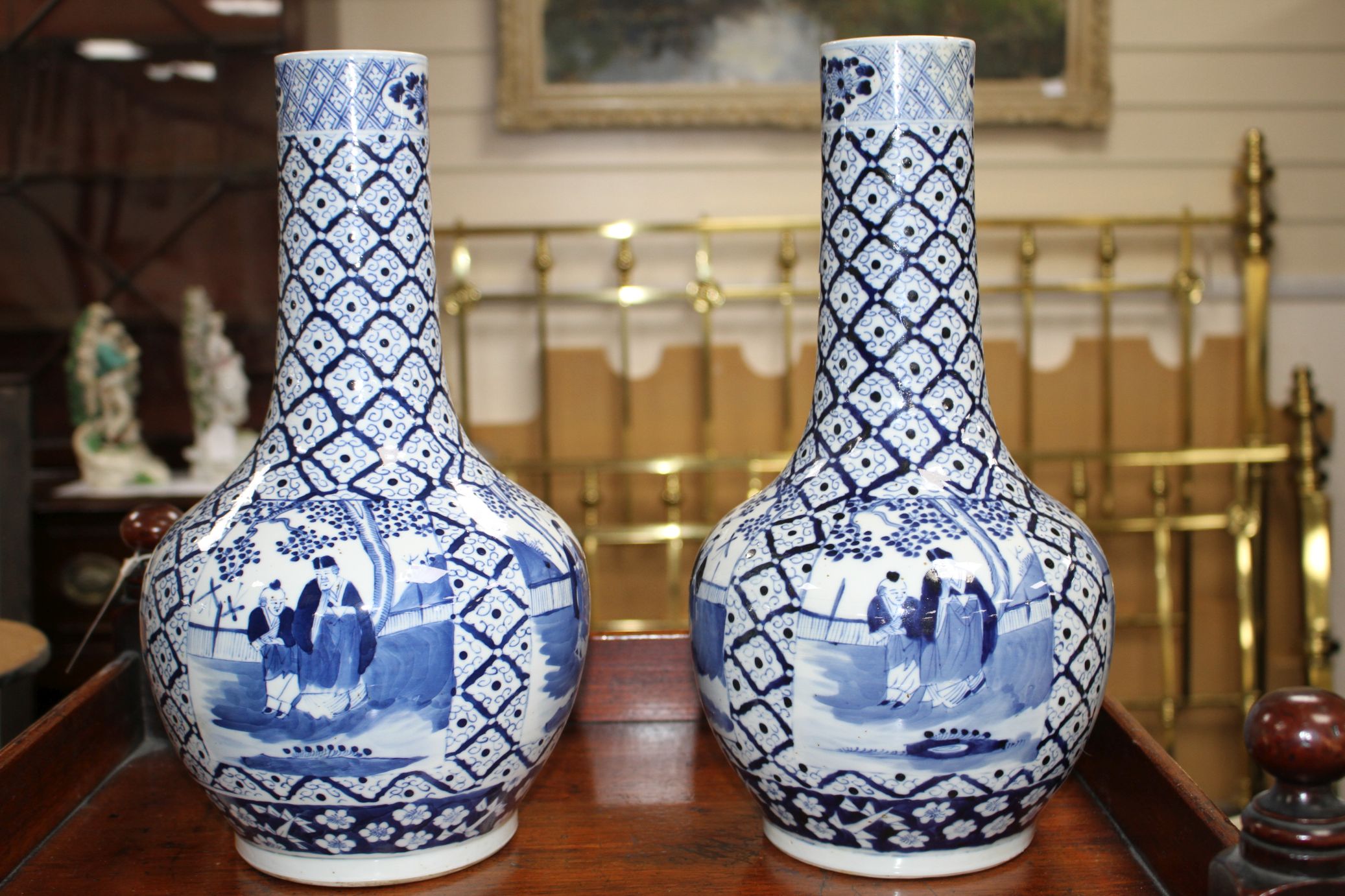 A pair of 19th century Chinese blue and white vases, decorated with panels of figures in gardens, - Image 2 of 6