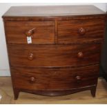 A Regency mahogany bowfront chest of two short and two graduated long drawers, on swept bracket