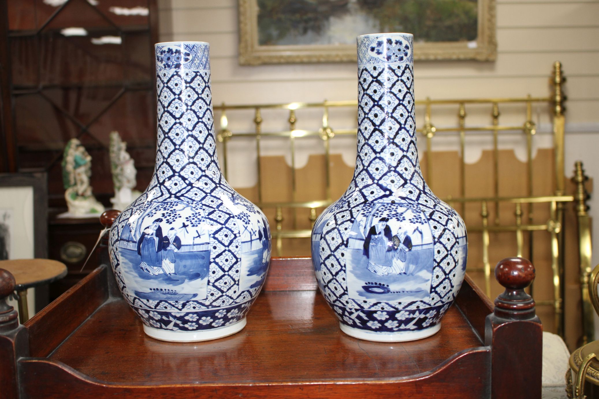 A pair of 19th century Chinese blue and white vases, decorated with panels of figures in gardens, - Image 3 of 6