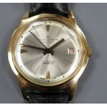 A gentleman's Swiss 18k yellow metal Fleurier automatic wrist watch, with baton numerals and date